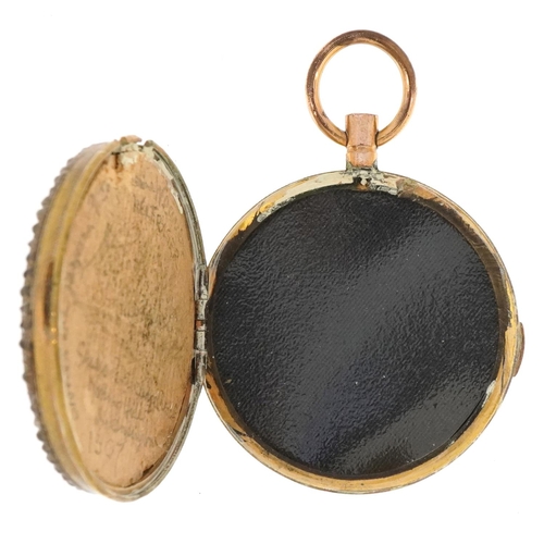 215 - Large antique gem set gilt metal locket inset with a circular portrait miniature hand painted onto c... 