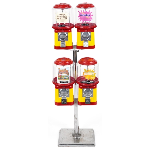 2087 - Four vintage beaver gumball dispensers on chrome plated stand, 129cm high