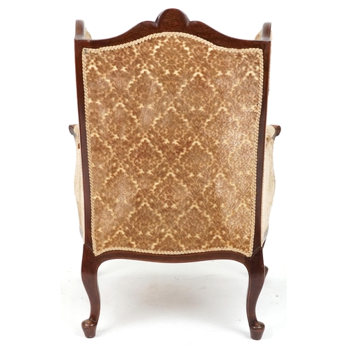 2033 - Edwardian inlaid mahogany wingback armchair with floral upholstery, 111cm high