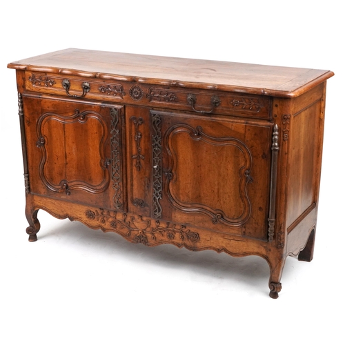 2038 - Provincial French fruit wood sideboard carved with flowers fitted with a drawer above a cupboard bas... 