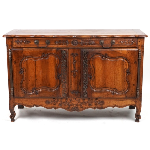 2038 - Provincial French fruit wood sideboard carved with flowers fitted with a drawer above a cupboard bas... 