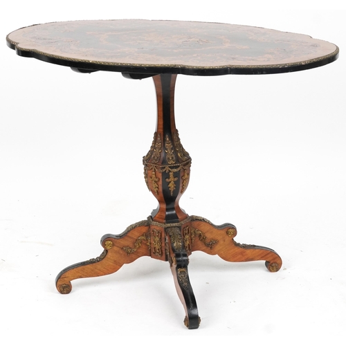 2001 - 19th century continental kingwood, ebony and marquetry inlaid tilt top centre table with shaped top ... 