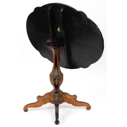 2001 - 19th century continental kingwood, ebony and marquetry inlaid tilt top centre table with shaped top ... 