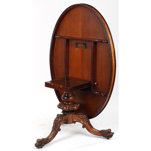 2017 - WITHDRAWN - Victorian rosewood tilt top breakfast table with carved bulbous column on lion mask feet... 