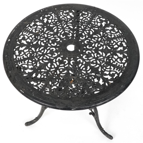 2154 - Black painted cast metal circular garden table with three chairs, 70.5cm high x 69cm in diameter