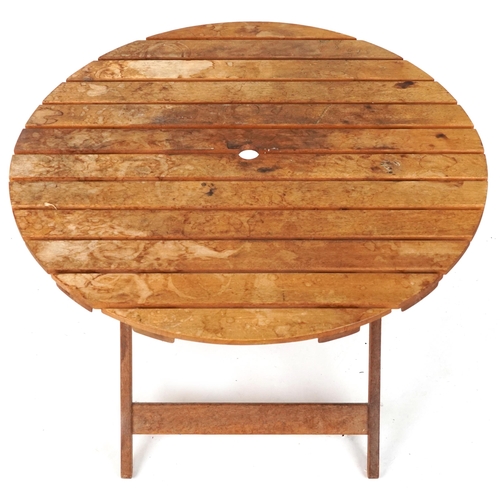 2155 - Folding garden teak circular table with four chairs, the table 93cm H x 91cm in diameter, the chairs... 