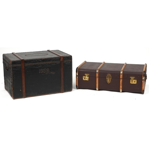 2092 - Two Victorian and later trunks including a metal studded wooden bound example dated 1859, the larges... 