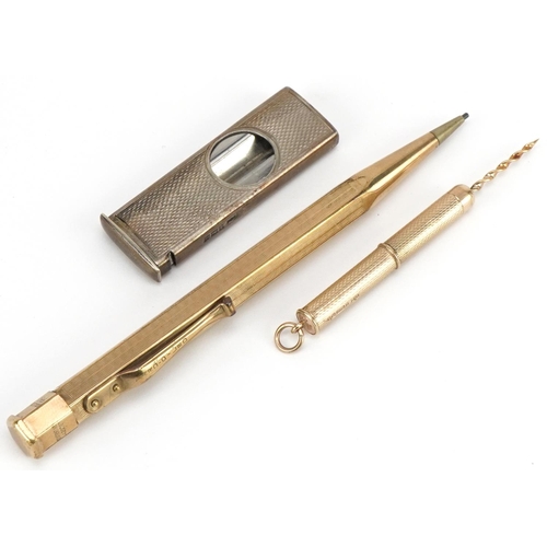 712 - Objects comprising 9ct gold propelling toothpick, silver cigar cutter and rolled gold Yard-O-Led pro... 