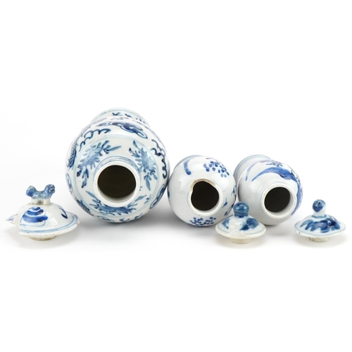 724 - Three Chinese blue and white porcelain baluster vases with covers including one hand painted with tw... 