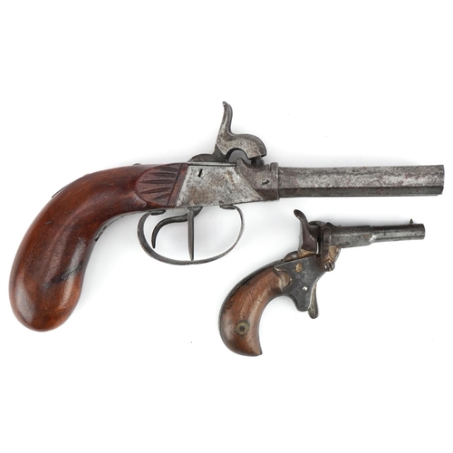 1429 - Two antique pistols including a double barrel percussion cap example with various proof marks, the l... 