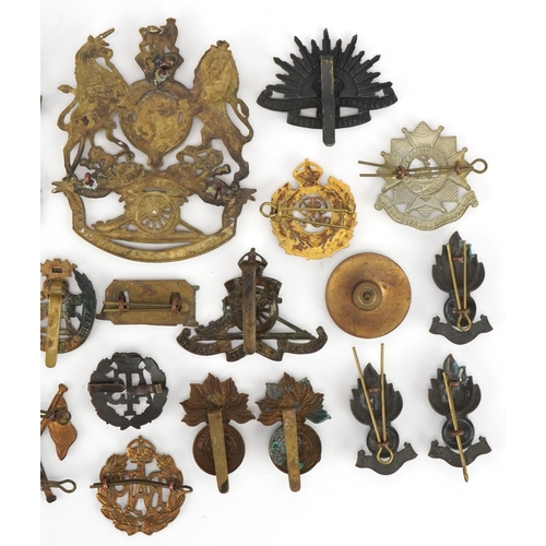 1380 - British military cap badges and a Victorian Royal Field Artillery helmet plate, the cap badges inclu... 