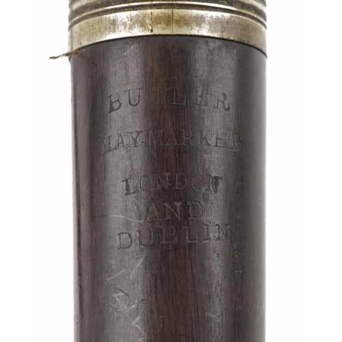 1016 - Three Victorian rosewood flute sections and a horn mouthpiece, of the pieces impressed Butler Haymar... 