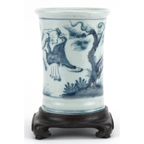 460 - Chinese blue and white brush pot on hardwood stand hand painted with figures in a landscape, overall... 