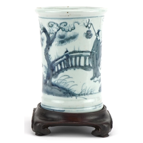 460 - Chinese blue and white brush pot on hardwood stand hand painted with figures in a landscape, overall... 