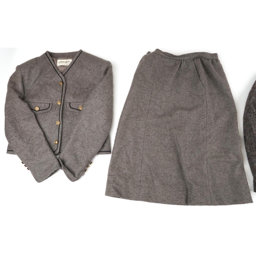 1111 - Vintage Jaeger clothes comprising ladies tweed jacket, size 12-14 and a two piece woollen suit, size... 