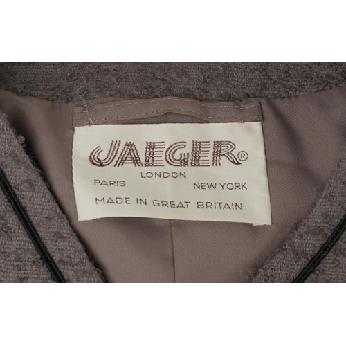 1111 - Vintage Jaeger clothes comprising ladies tweed jacket, size 12-14 and a two piece woollen suit, size... 