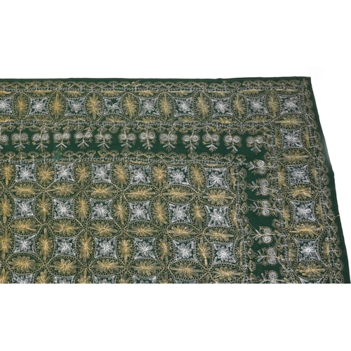 426 - Large Indian green ground textile finely embroidered with flowers, 245cm x 137cm