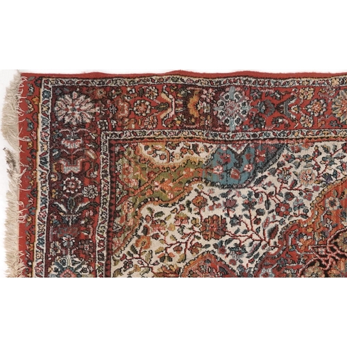 2191 - Rectangular Persian rug with red ground border having and allover repeat floral design, 190cm x 135c... 