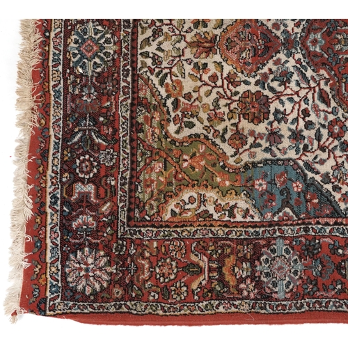 2191 - Rectangular Persian rug with red ground border having and allover repeat floral design, 190cm x 135c... 