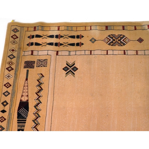 2193 - Rectangular Aztec style beige ground rug having and allover repeat design, 300cm x 202cm