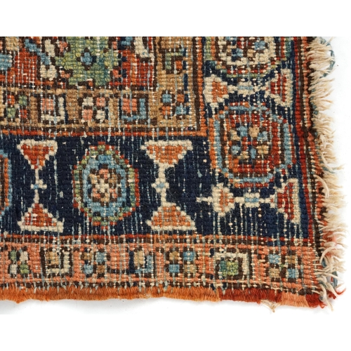 2186 - Rectangular Turkish rug with allover geometric and animal design, 200cm x 114cm