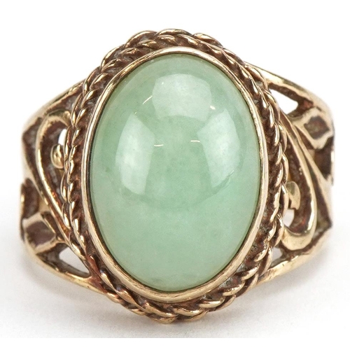 3177 - 9ct gold cabochon green jade ring with pierced floral shoulders, size N, 7.3g