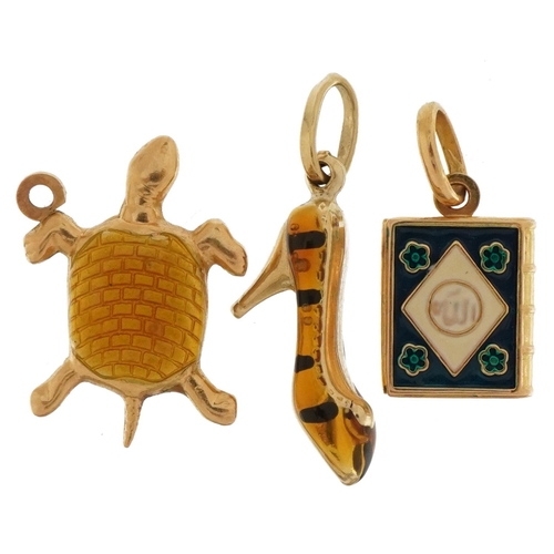 3184 - Three gold and enamel charms comprising 18ct gold Quran, 9ct gold high heeled shoe and unmarked gold... 