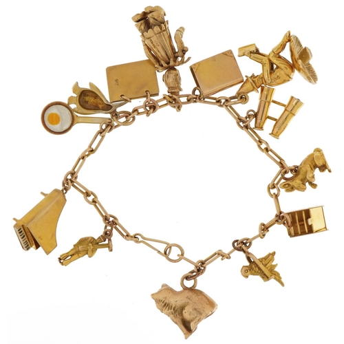 3008 - 9ct gold charm bracelet with a selection of mostly gold charms including articulated clown, pixie on... 