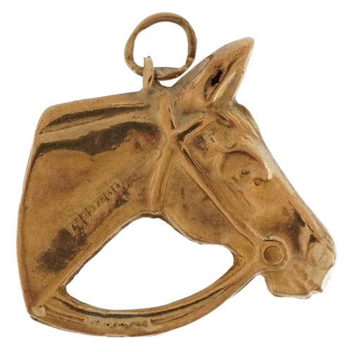 3692 - 9ct gold horsehead charm, 2.3cm high, 1.5g