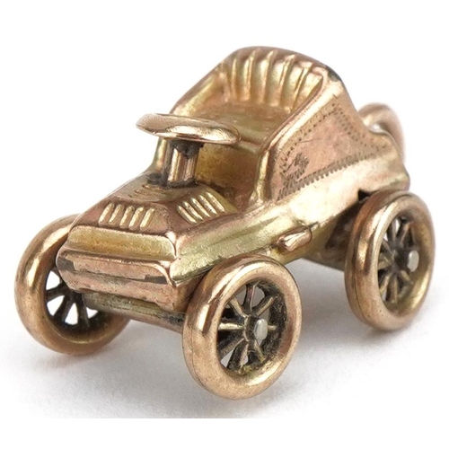 3405 - 9ct gold classic car charm, 1.9cm in length, 1.9g