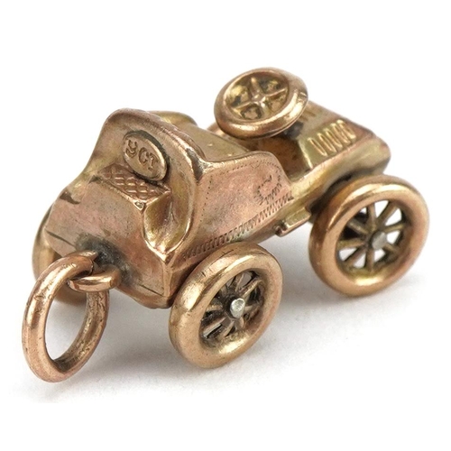 3405 - 9ct gold classic car charm, 1.9cm in length, 1.9g