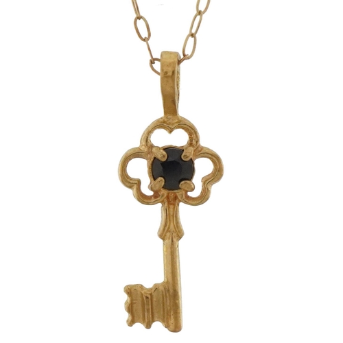 3693 - Yellow metal sapphire key pendant on a 9ct gold necklace, 2cm high and 40cm in length, total weight ... 