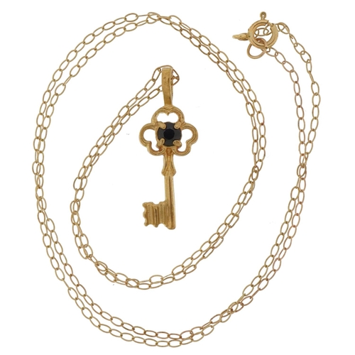 3693 - Yellow metal sapphire key pendant on a 9ct gold necklace, 2cm high and 40cm in length, total weight ... 