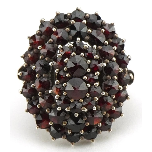 3064 - Antique 9ct gold Bohemian garnet four tier cluster ring, size J, 6.6g