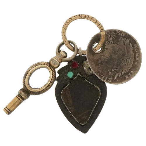 3041 - Georgian unmarked gold split ring with 1811 token, yellow metal watch key and silver fob set with se... 