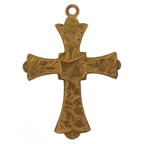 3664 - 9ct gold Etruscan style floral engraved cross pendant, 2.4cm high, 0.8g