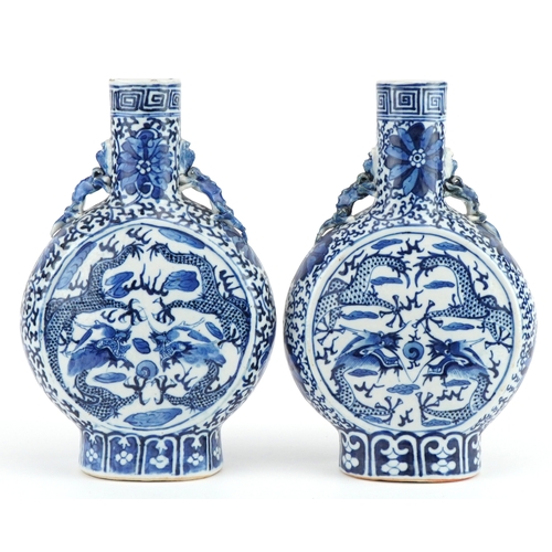 19 - Pair of Chinese blue and white porcelain moon flasks with animalia handles each hand painted with dr... 