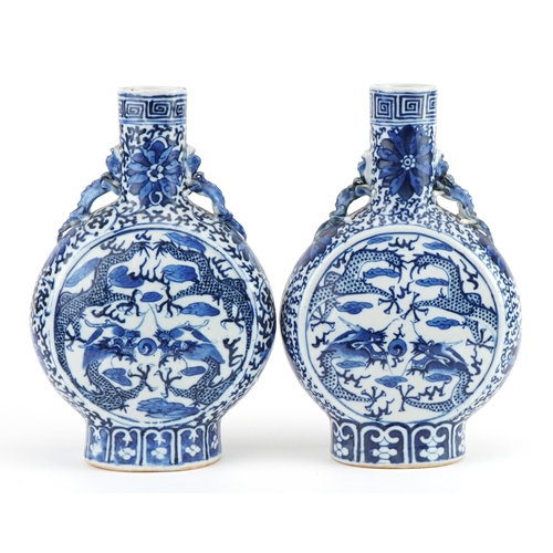 19 - Pair of Chinese blue and white porcelain moon flasks with animalia handles each hand painted with dr... 