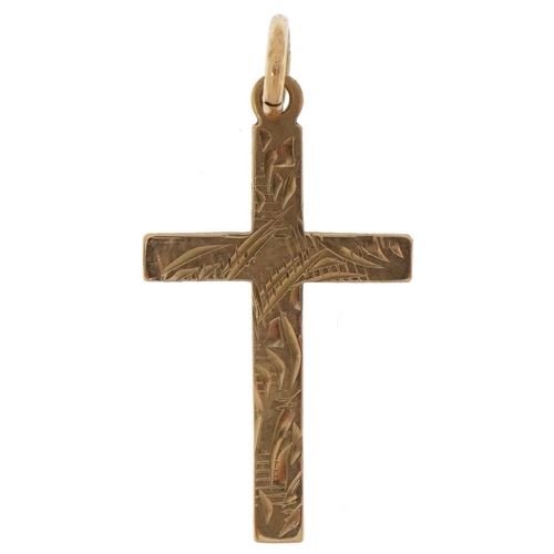 3668 - 9ct gold floral engraved cross pendant, 2.1cm high, 0.5g