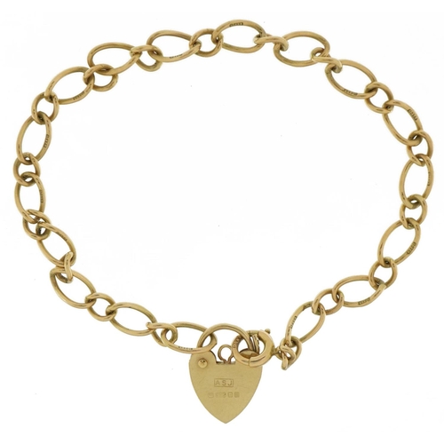 3493 - 9ct gold bracelet with 9ct gold love heart padlock, 16cm in length, 5.1g