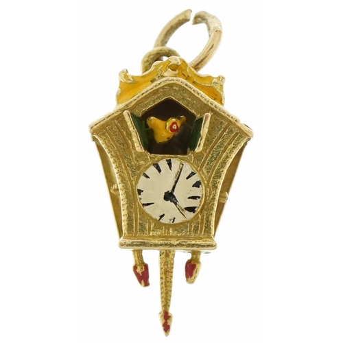 3445 - 9ct gold and enamel cuckoo clock charm with moving pendulum and cuckoo, 2cm high, 2.0g