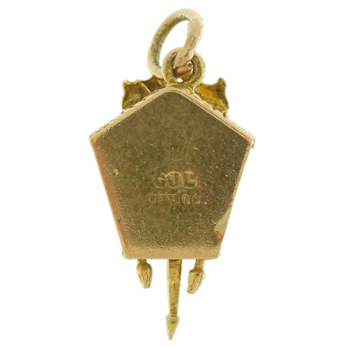 3445 - 9ct gold and enamel cuckoo clock charm with moving pendulum and cuckoo, 2cm high, 2.0g