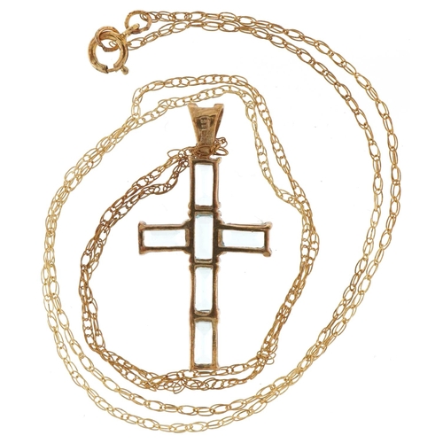 3337 - 9ct gold blue topaz cross pendant on a 9ct gold necklace, 2.8cm high and 44cm in length, 2.1g