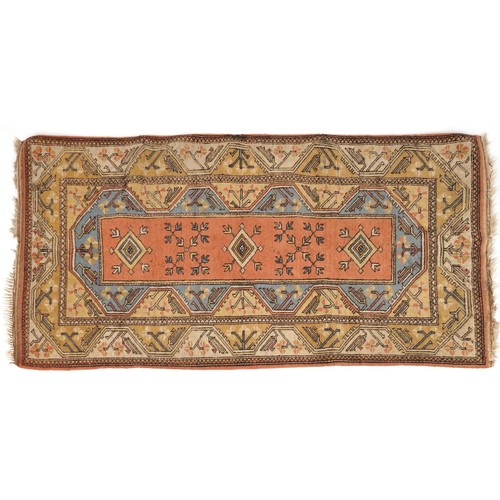 2192 - Rectangular Turkish rug having and allover repeat design, 215cm x 120cm