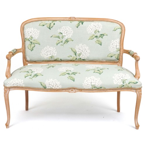 2063 - French style lightwood two seater salon settee on cabriole legs with floral upholstery, 96cm high x ... 