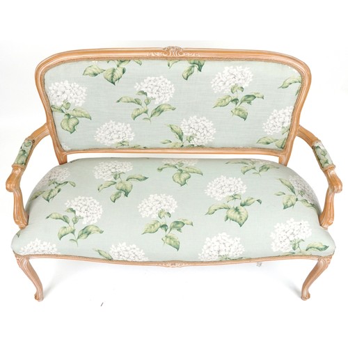 2063 - French style lightwood two seater salon settee on cabriole legs with floral upholstery, 96cm high x ... 