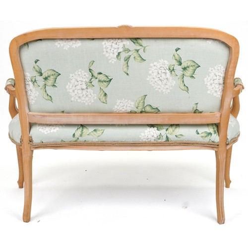 2063 - French style lightwood two seater salon settee on cabriole legs with floral upholstery, 96cm high x ... 