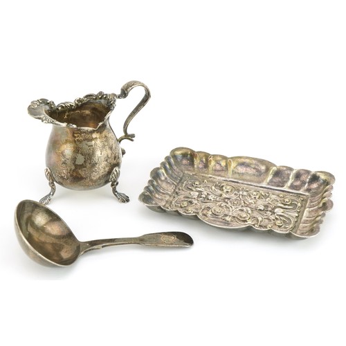 693 - Silver and silver plate comprising Victorian silver caddy spoon, silver three footed cream jug and a... 