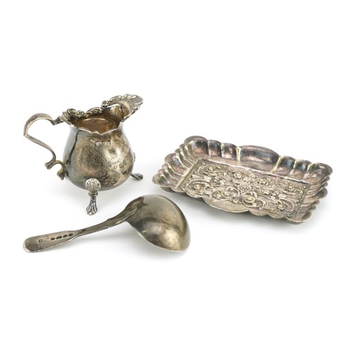 693 - Silver and silver plate comprising Victorian silver caddy spoon, silver three footed cream jug and a... 