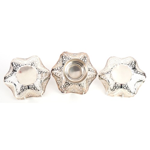 689 - S J Levi & Co, pair of Elizabeth II silver pierced bonbon dishes and a similar footed bonbon dish, B... 